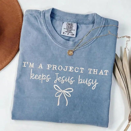I'm a Project That Keeps Jesus Busy Embroidered Christian Shirt | Custom Thread Color
